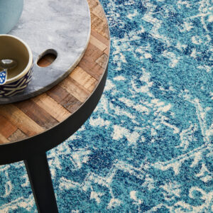 Faded Blue Area Rug Table on rug