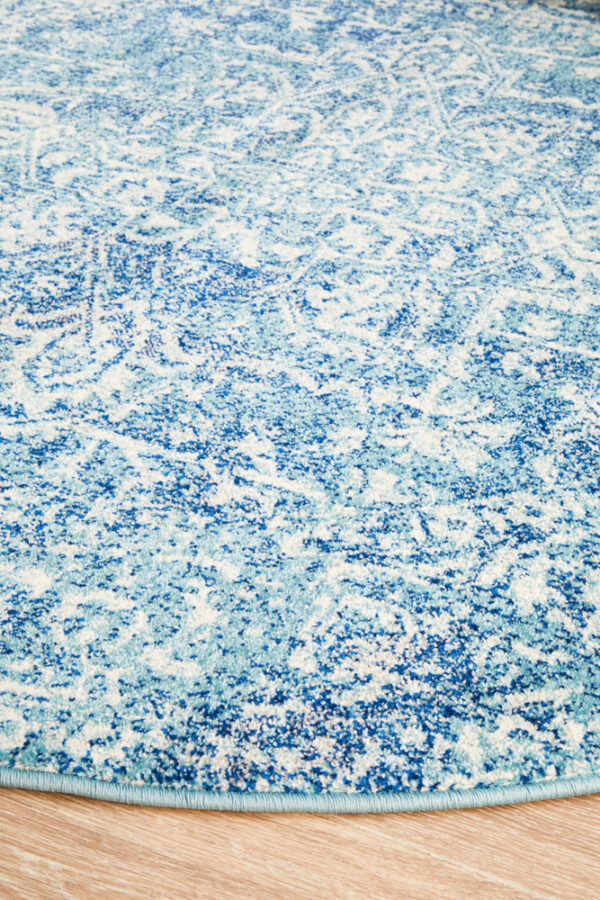 Faded Blue Area Rug side of round