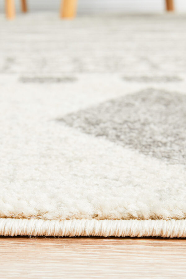 Modern Tribal Design Grey Rug overlocked edge