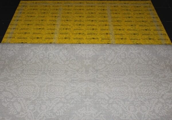 Premium Rug Underlay with top white tape removed ready for the rug